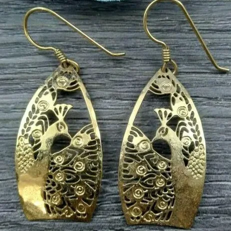Wild Bryde Peacock Earrings, Brooch, Pendant Hallmark Photo, Face Only, Framed - Unofficial Wild Bryde Collector's Guide