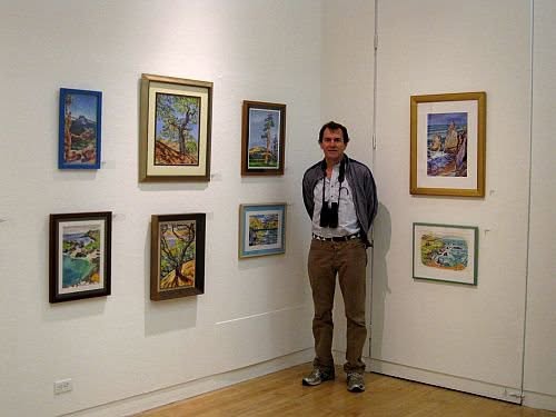 Mike Warner at an exhibition of his wildlife paintings. Source: Wild Bryde official Facebook